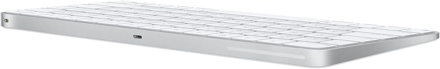 Apple Magic Keyboard (Latest Model) - International English - Silver: Enhance your workspace with this stylish and functional Magic Keyboard by Apple. 0194252543382